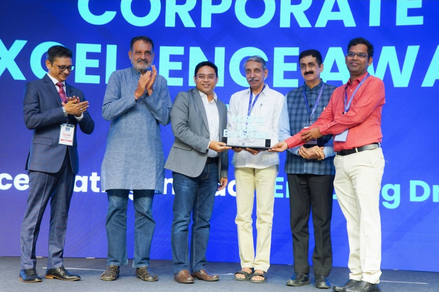 Team receiving an award at MIECA